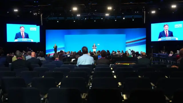 Defence Secretary Grant Shapps speaking at Conservative Party Conference