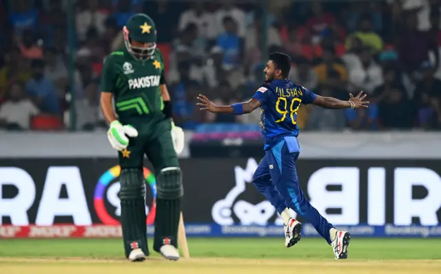Dilshan Madushanka of Sri Lanka celebrates the wicket of Babar Azam of Pakistan during the ICC Men's Cricket World Cup India 2023 between Pakistan and Sri Lanka at Rajiv Gandhi International Stadium