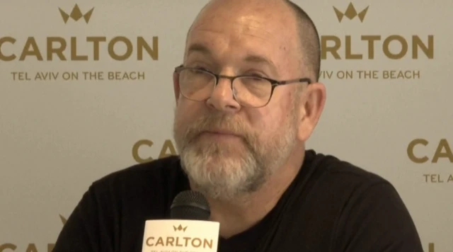 Jonathan Dekel-Chen speaking at press conference in Tel Aviv