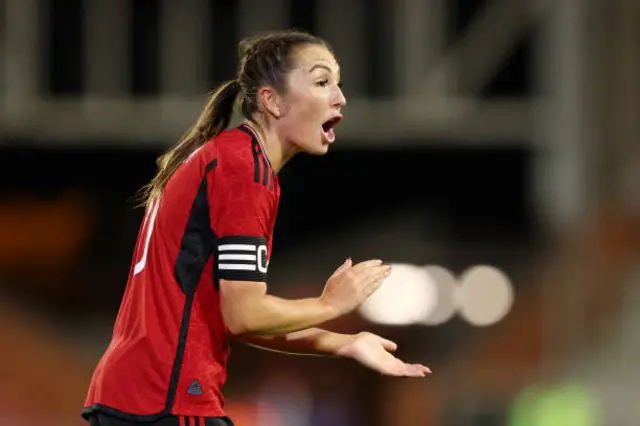 Katie Zelem applauds