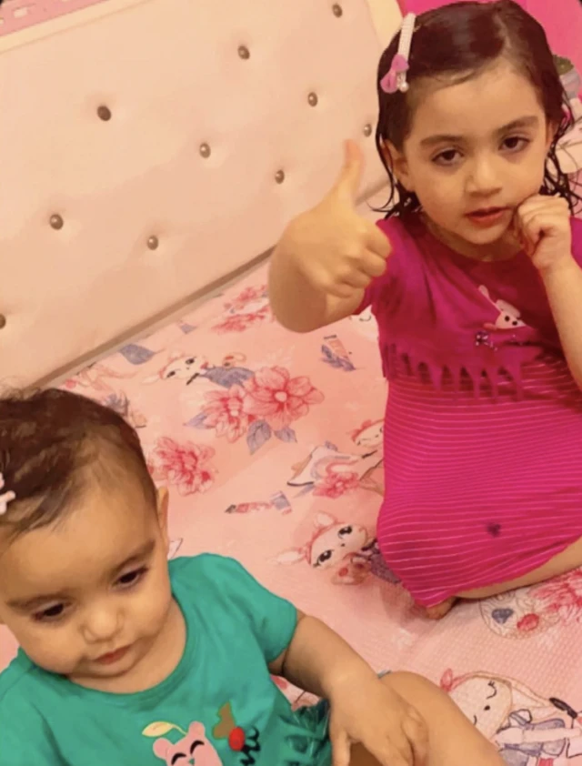 Sila, 1, and Nawal, 4