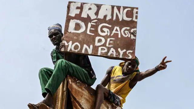 People protesting outside the Niger and French airbase in Niamey to demand the departure of the French army from Niger - 2 September 2023