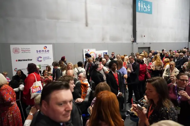 Delegates queue for entry for the key note speech by Labour leader Sir Keir Starmer on day three of the Labour Party conference on October 10, 2023 in Liverpool, England