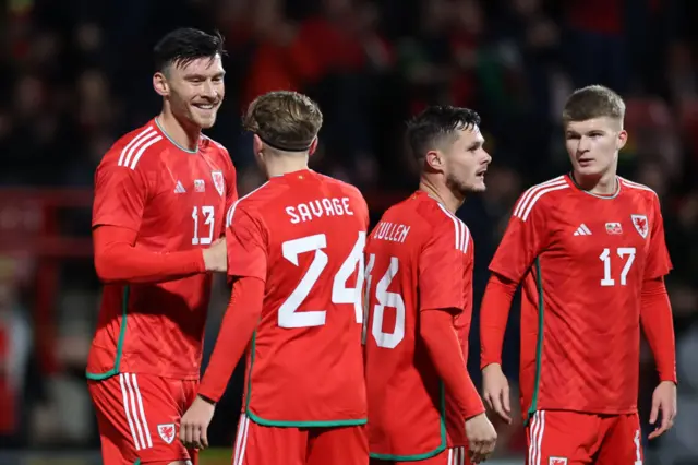 Wales players celebrate Kieffer Moore's goal against Gibraltar