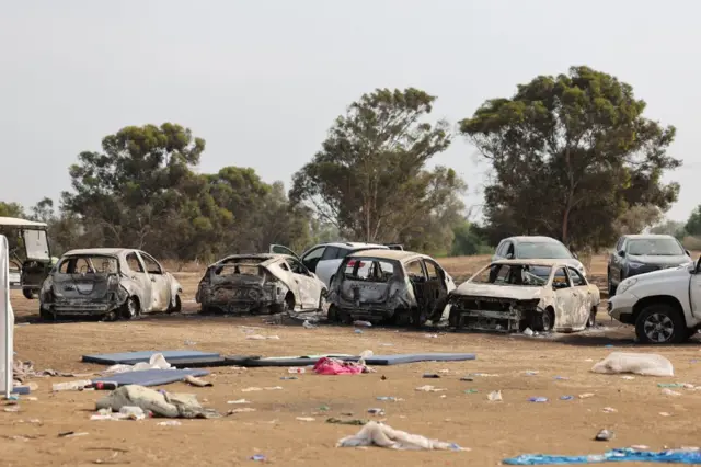 Burned cars left behind at the Supernova music festival