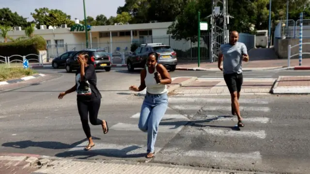 People run for cover as sirens sound in Ashkelon