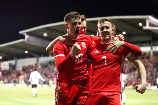 Wales player Ben Woodburn celebrates