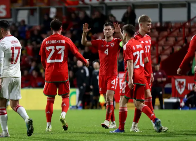 Wales players celebrate Ben Davies' goal against Gibraltar