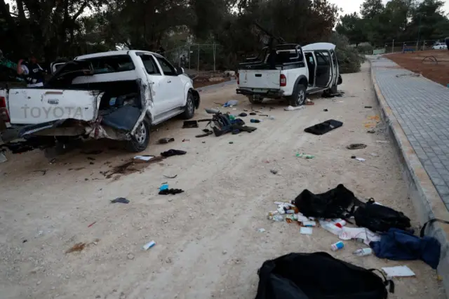 Damaged cars used by Hamas militants in Kibbutz Be'eri