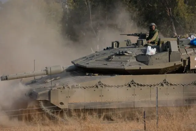 A tank drives through northern Israel