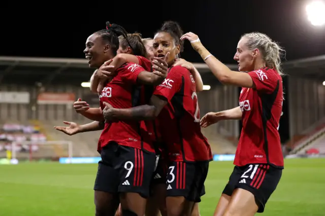 Manchester United celebrate their goal against PSG womens