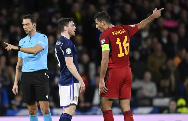 Rodri remonstrates with Scotland skipper Andy Robertson