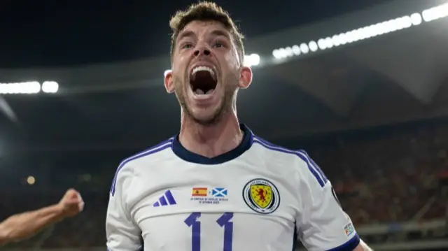 Ryan Christie celebrates before the goal is disallowed