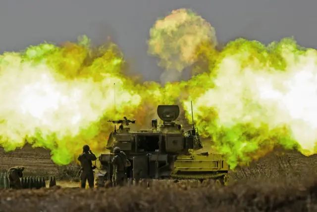 An IDF artillery unit fires towards Gaza on 11 October