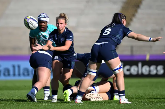 Mairi McDonald passes the ball