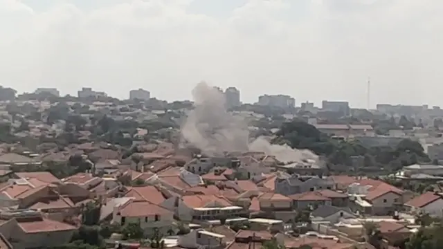 Smoke rises from a building in Ashkelon