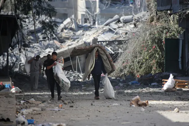 Palestinians displaced from their homes as a result of Israeli raids on October 13, 2023 in Gaza City