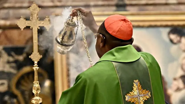 Archbishop of Kinshasa cardinal Fridolin Ambongo Besengu celebrates a Mass for 16th Ordinary General Assembly of the Synod of Bishops at St. Peter's Basilica on October 13, 2023 in Vatican City, Vatican.