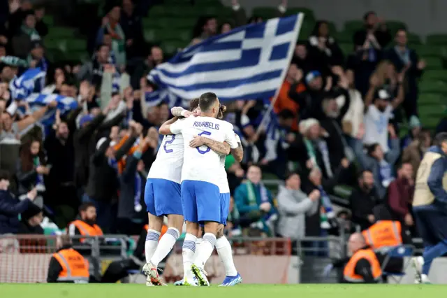 Greece celebrate their opening goal against Republic of Ireland