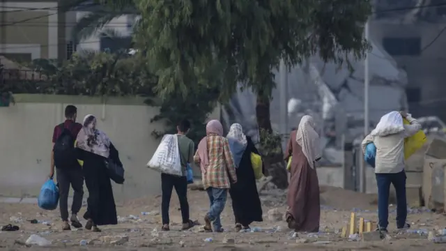 Residents of Gaza City begin to evacuate following an Israeli warning