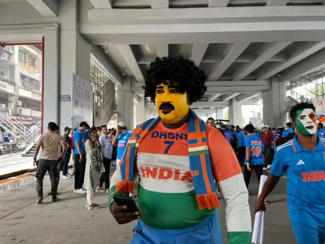 A Dhoni fan outside the stadium