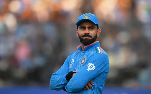 Virat Kohli of India looks on during the ICC Men's Cricket World Cup India 2023 between India and Afghanistan at Arun Jaitley Stadium on October 11, 2023 in Delhi, India.