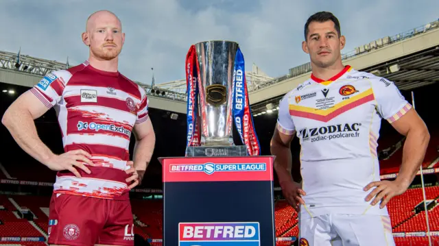 Wigan's Liam Farrell & Catalans Benjamin Garcia with the Betfred Super League Grand Final trophy