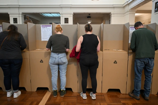 Voters at the ballot box at the Old Australian Parliament House in Canberra