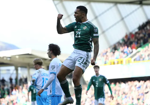 Josh Magennis celebrates scoring