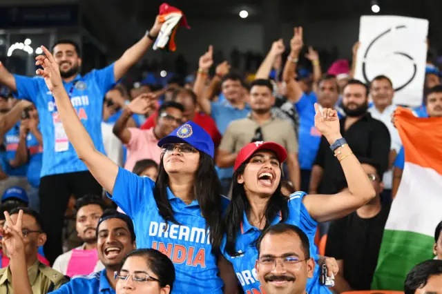 India fans celebrate in the game against Pakistan