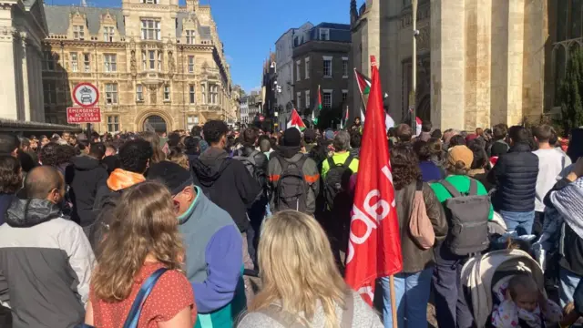 Demonstrators make their way through Cambridge