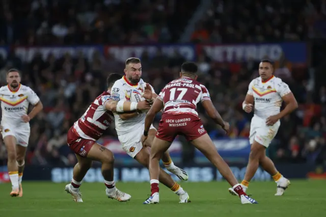 Catalans's Mike McMeeken is tackled