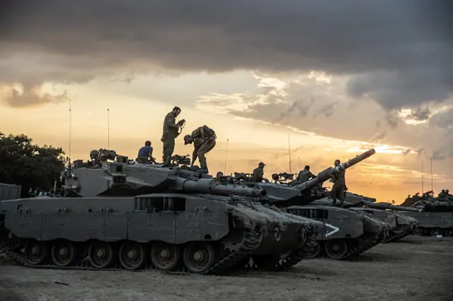 A view of an Israeli military camp as Israel continues to deploy soldiers, tanks and armored vehicles