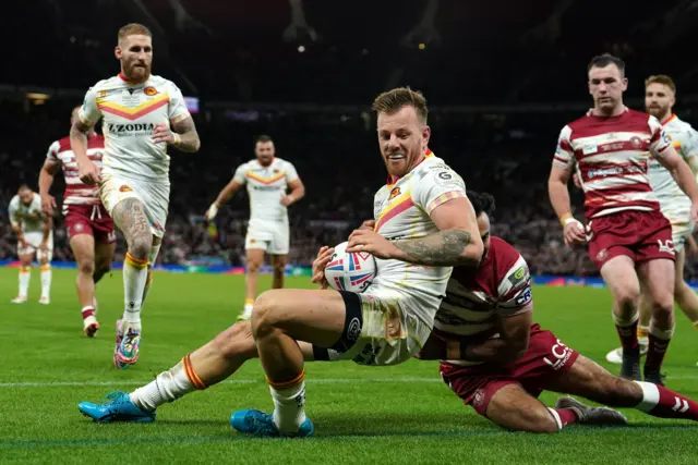 Catalans' Tom Johnstone prevents Wigan scoring