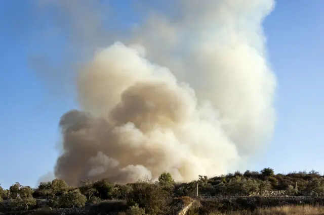 Smoke rises after Israeli army shelling the Dhayra region, Lebanon on October 13, 2023.