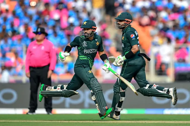 Mohammad Rizwan and Babar Azam run between the wickets