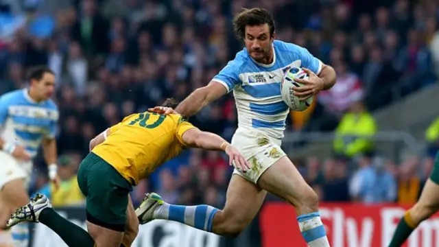 Former Argentinian centre Marcelo Bosch with a hand off against Australia