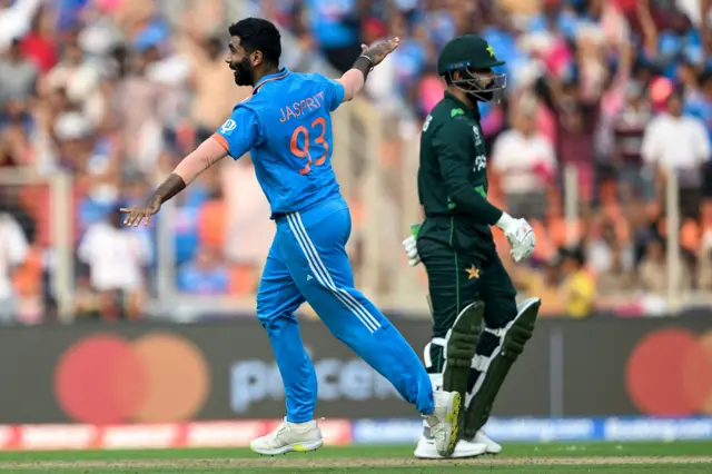 Jasprit Bumrah celebrates the wicket of Pakistan's Shadab Khan