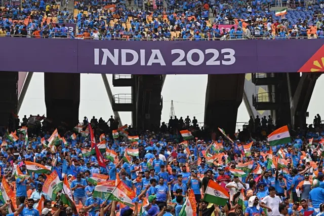 India fans cheer before the start of the 2023 ICC Men's Cricket World Cup one-day international (ODI) match between India and Pakistan