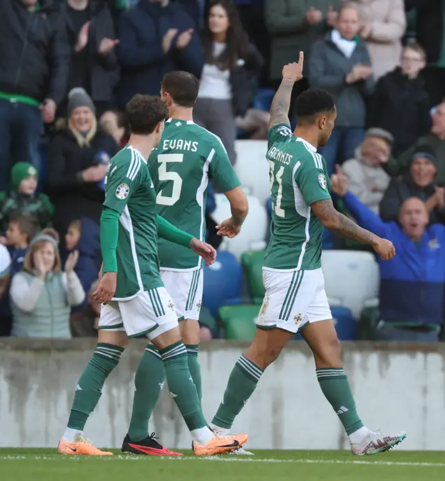 Josh Magennis celebrates scoring