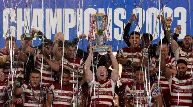 Wigan lift the Super League trophy