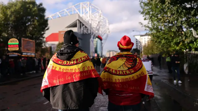 Catalans Dragons fans on their way to Old Trafford