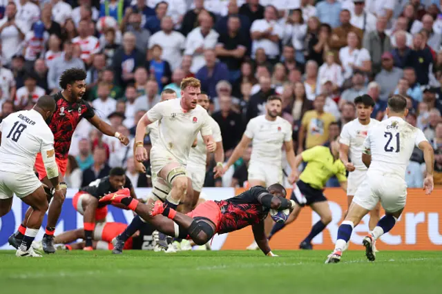 Peni Ravai of Fiji scores a try