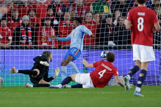 Strandberg watches on as his interception heads towards the Norway goal