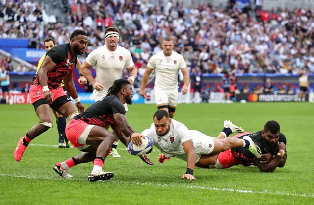 Joe Marchant dives over the try line to score