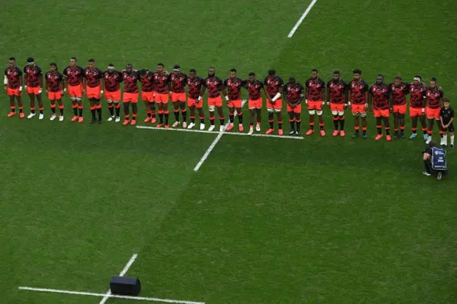 Fiji players line up for the anthem