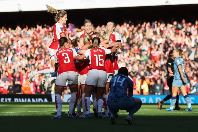 Arsenal players celebrate