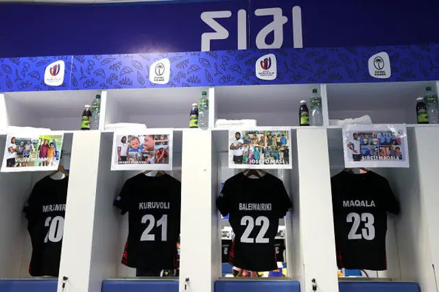 Fiji players shirts hang in the changing rooms