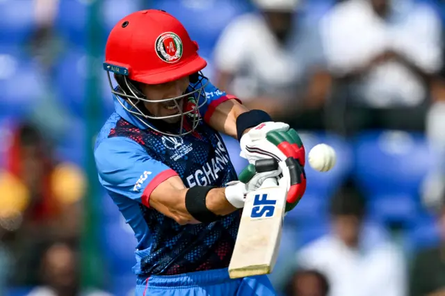 Afghanistan's Rahmanullah Gurbaz plays a shot during the 2023 ICC Men's Cricket World Cup one-day international (ODI) match between England and Afghanistan at the Arun Jaitley Stadium