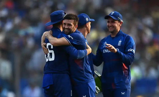 Mark Wood celebrates the wicket of Mohammad Nabi